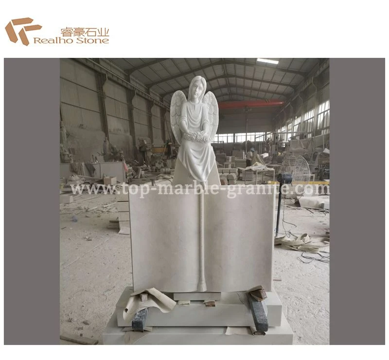 monument hand and book